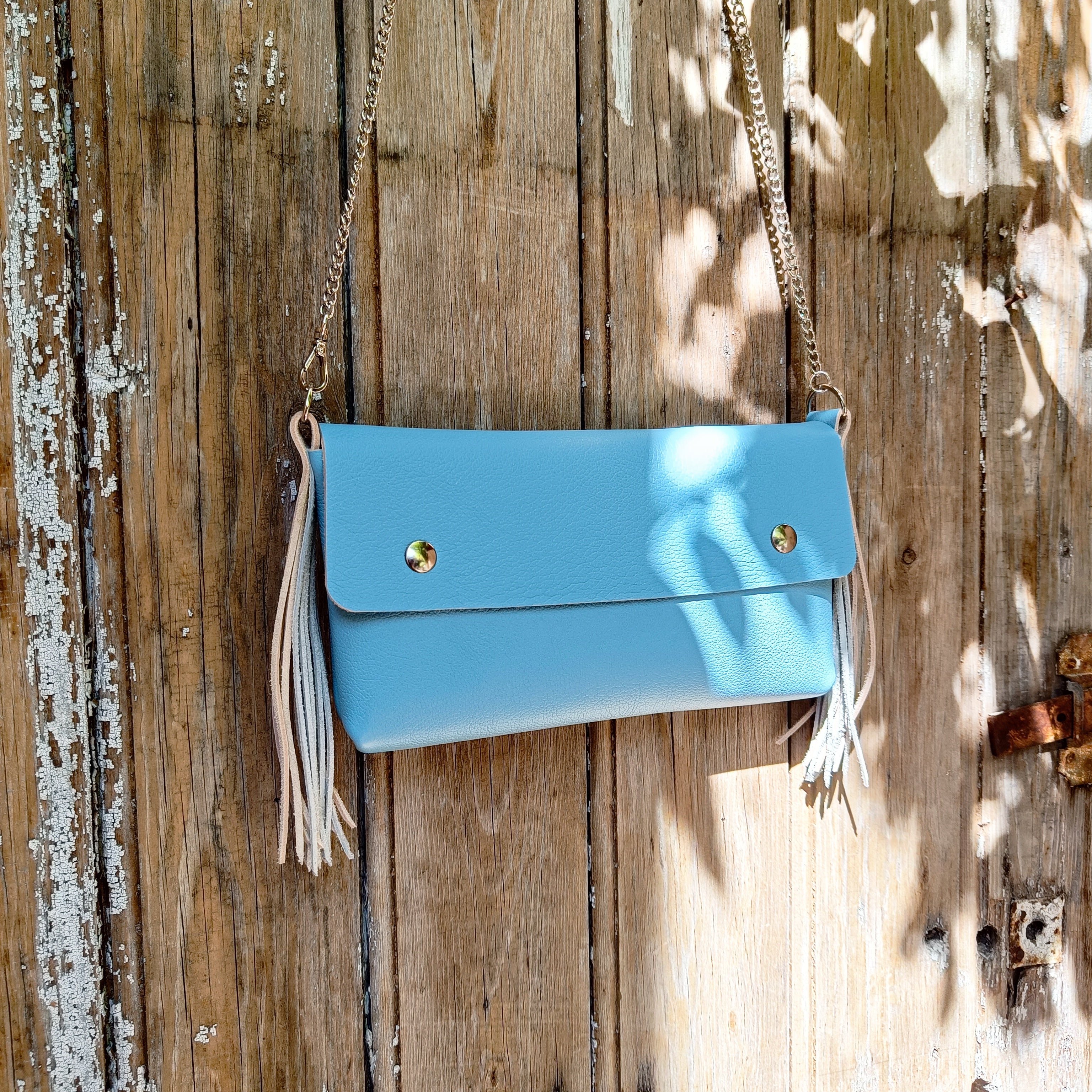 sac à main pochette anthyllis chaîne acier cuir français maroquinerie éthique responsable made in france faméthic rose bleu lavande blanc frange