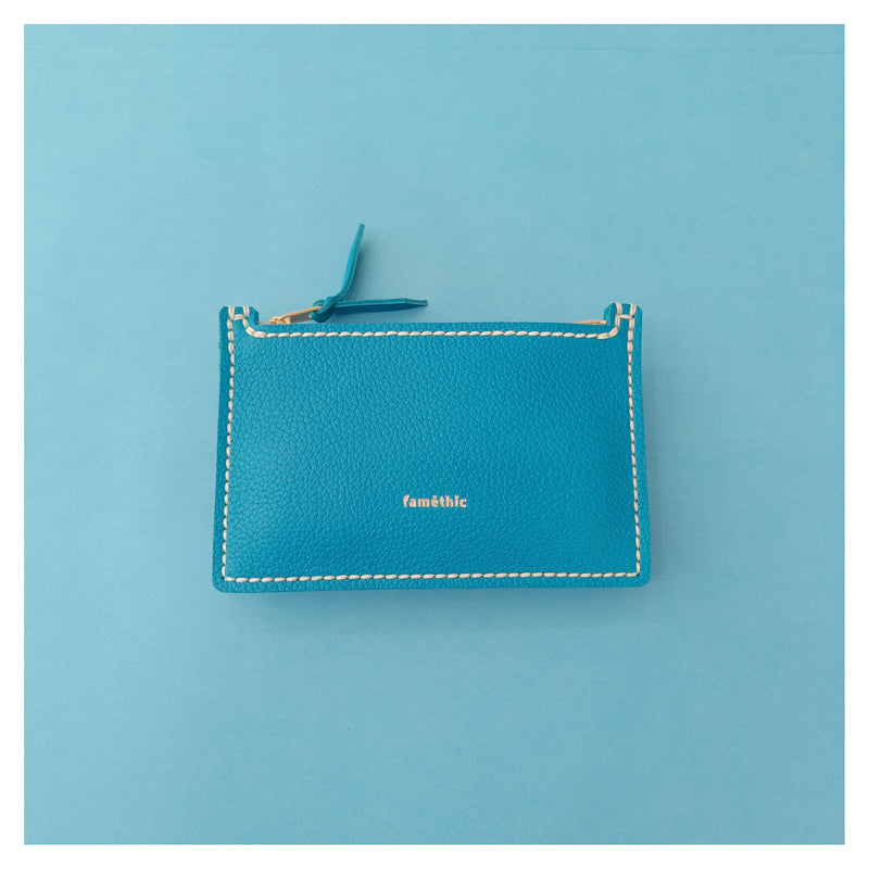 petite pochette zippée en cuir turquoise collection Marseille H2O faméthic maroquinerie